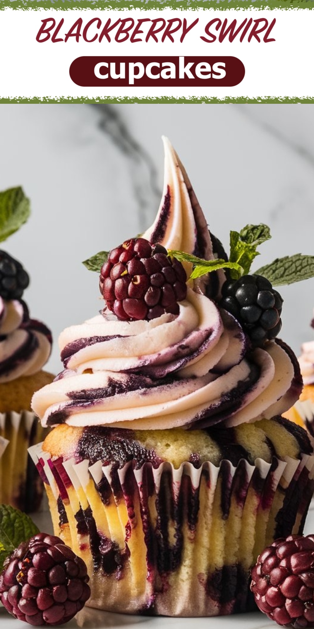 A close-up of a blackberry swirl cupcake with a marbled swirl of vanilla and blackberry frosting, topped with a fresh blackberry and mint leaf. The cupcake liner shows blackberry filling spilling out, with the text "Blackberry Swirl Cupcakes" overlayed at the top.