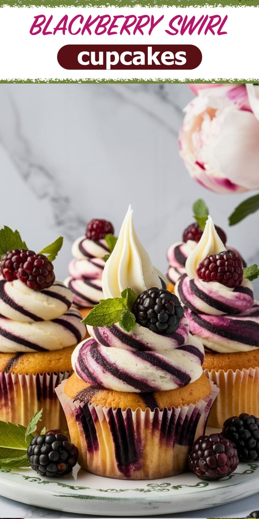 Close-up of blackberry swirl cupcakes with a generous swirl of vanilla and blackberry frosting. Topped with fresh blackberries and mint leaves, the cupcakes are displayed elegantly on a white plate. The text "Blackberry Swirl Cupcakes" is displayed at the top.