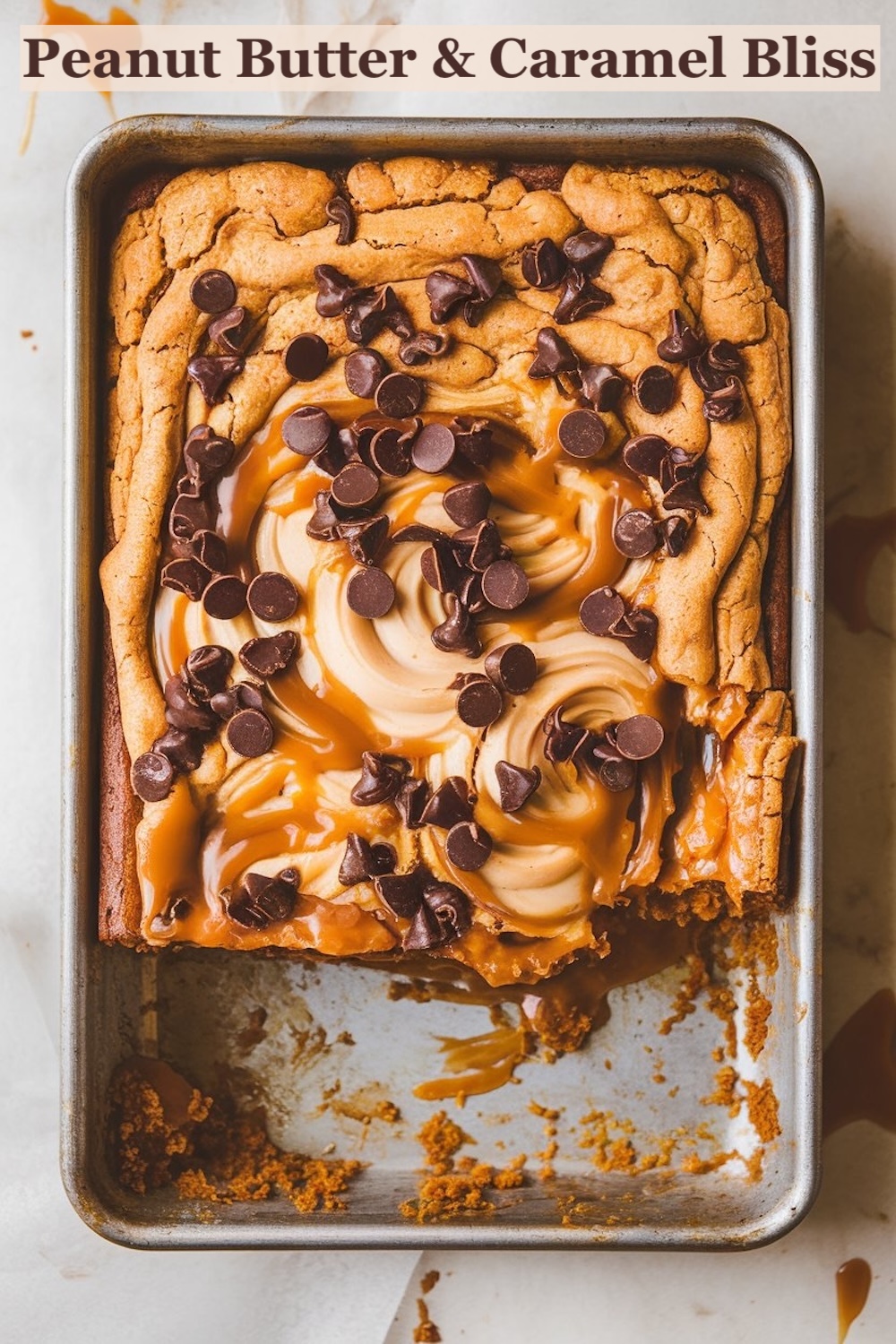 Overhead shot of a peanut butter caramel dump cake with chocolate chips in a baking pan, with text overlay 'Peanut Butter & Caramel Bliss' along the top.