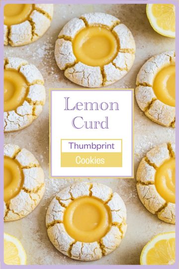 Close-up of Lemon Curd Thumbprint Cookies: A detailed view of soft, crackled cookies with golden lemon curd centers, dusted lightly with powdered sugar.