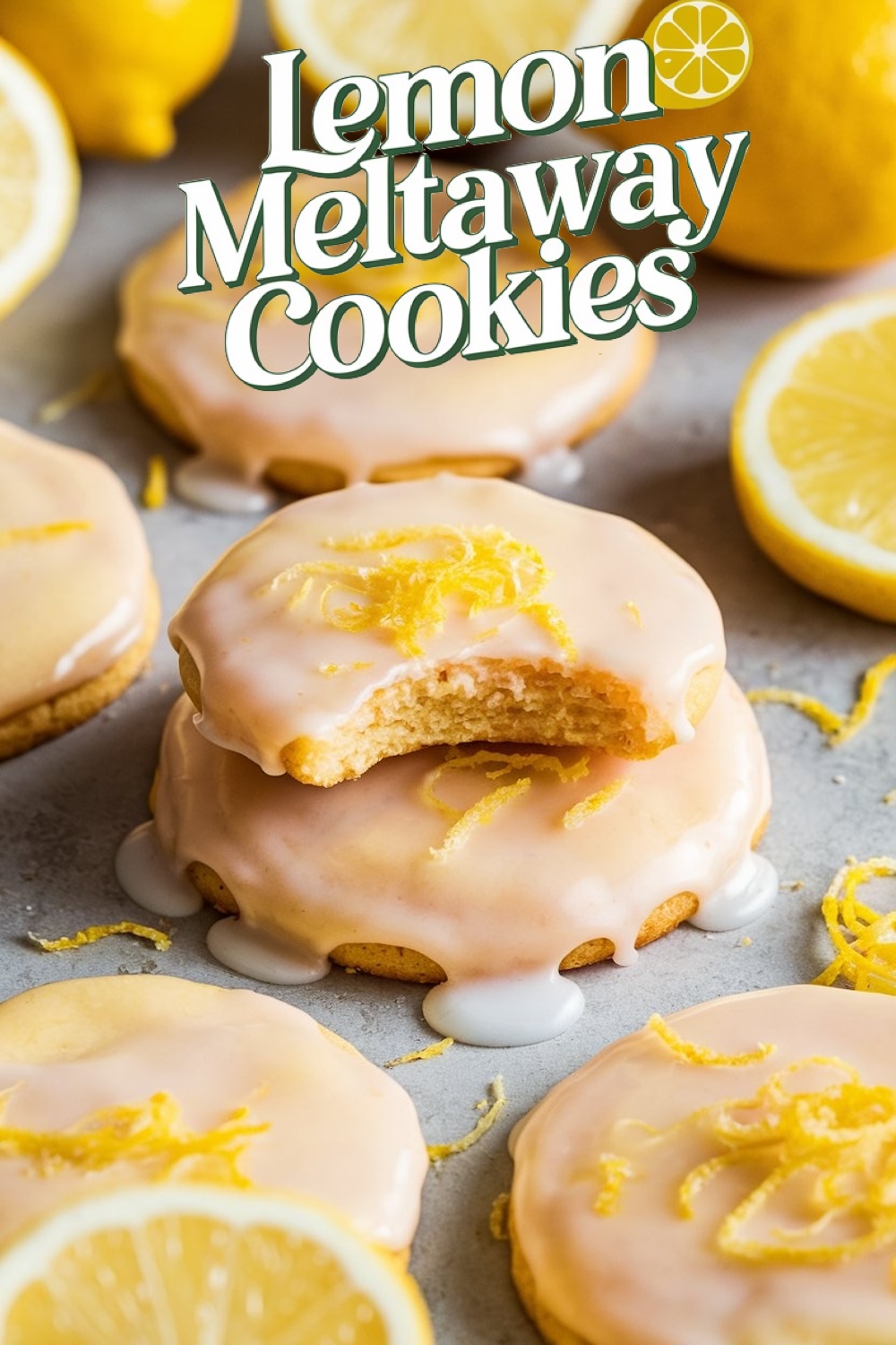 Close-up of lemon meltaway cookies topped with glaze and fresh lemon zest, showcasing their soft, citrusy texture.