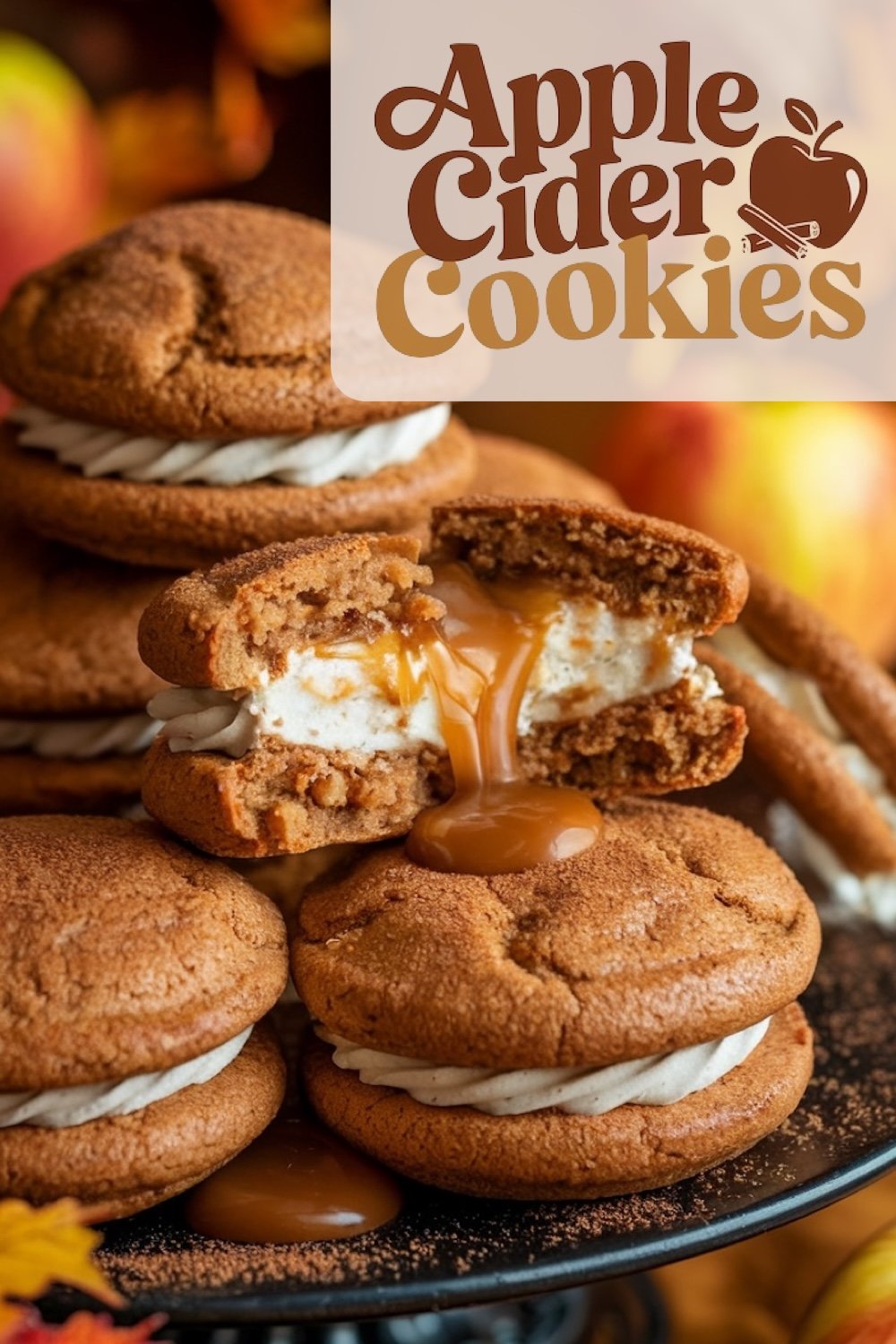 Apple Cider Cookies with creamy filling and caramel center. The close-up view shows cookies with a golden-brown, cinnamon-spiced shell, while the inside reveals the decadent, runny caramel dripping from the broken cookie, showcasing the creamy, spiced filling. Apples and fall leaves complete the warm, cozy atmosphere.