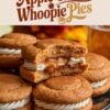 Apple Cider Whoopie Pies with caramel filling, cut in half, showcasing the gooey caramel center. The foreground highlights the whoopie pies' soft, cinnamon-infused cookie exterior with the luscious caramel oozing out, accompanied by smooth buttercream, against a backdrop of autumnal apples and warm seasonal hues.