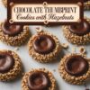 Elegant Chocolate Thumbprint Cookies with Hazelnuts, displayed on a marble surface, each filled with a shiny chocolate ganache.