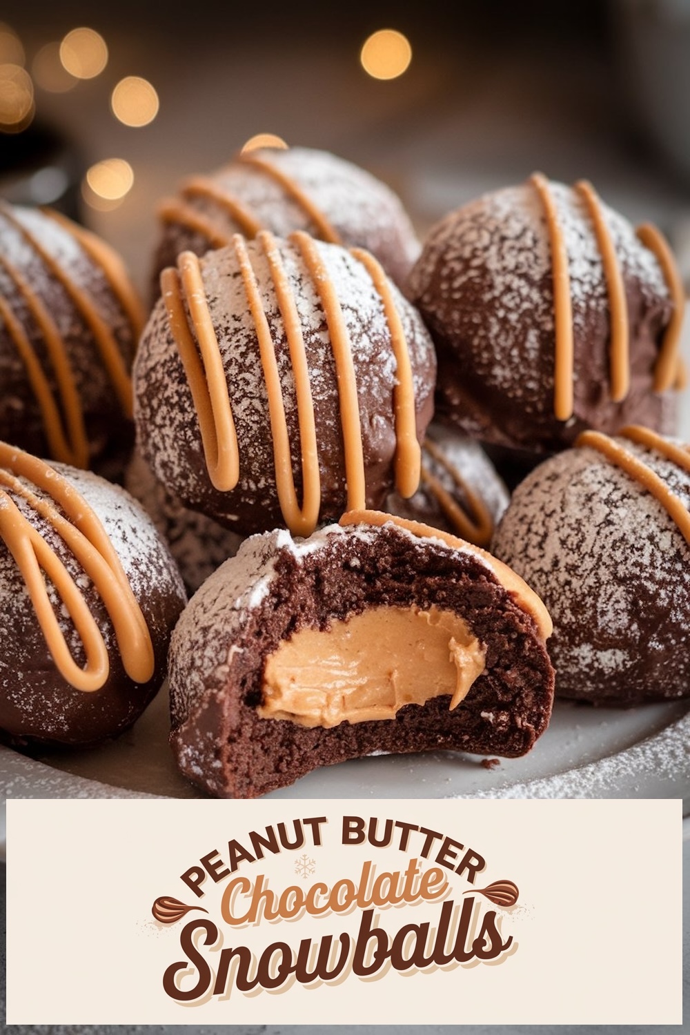 Peanut Butter Chocolate Snowballs dusted with powdered sugar and drizzled with peanut butter, with one snowball cut open to reveal a creamy peanut butter filling, presented under a festive caption.