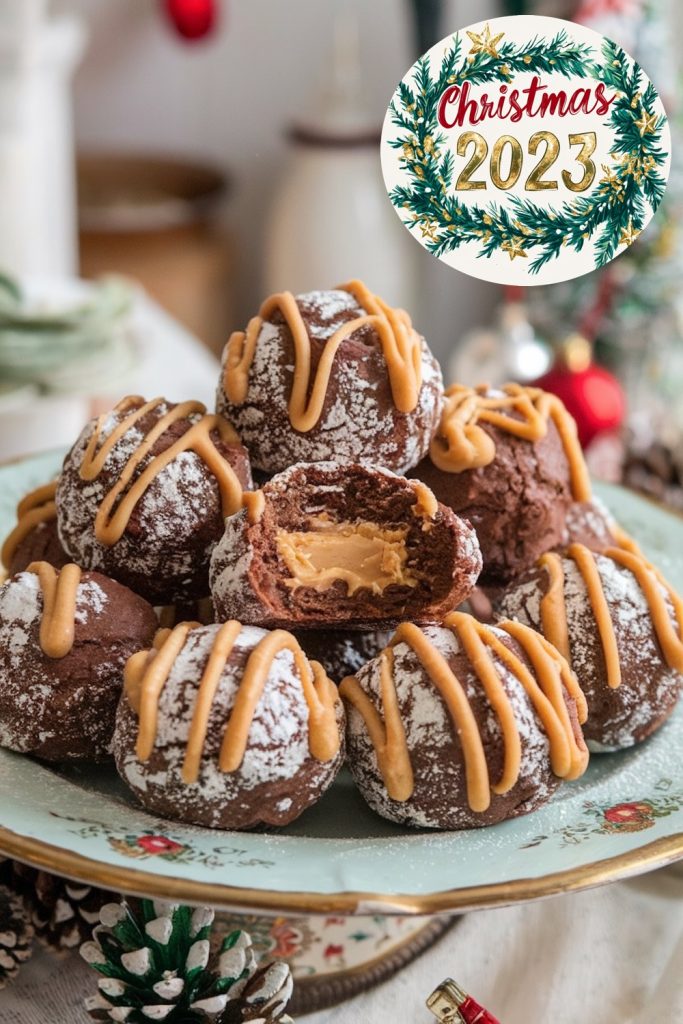 Chocolate peanut butter snowballs arranged on a cake stand, decorated with powdered sugar and caramel drizzle. A bitten snowball shows a rich peanut butter filling inside. A "Christmas 2023" sign and holiday decor add a seasonal touch to the scene.