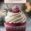 A completed red velvet cupcake topped with creamy white frosting and a fresh raspberry, surrounded by holiday decorations.