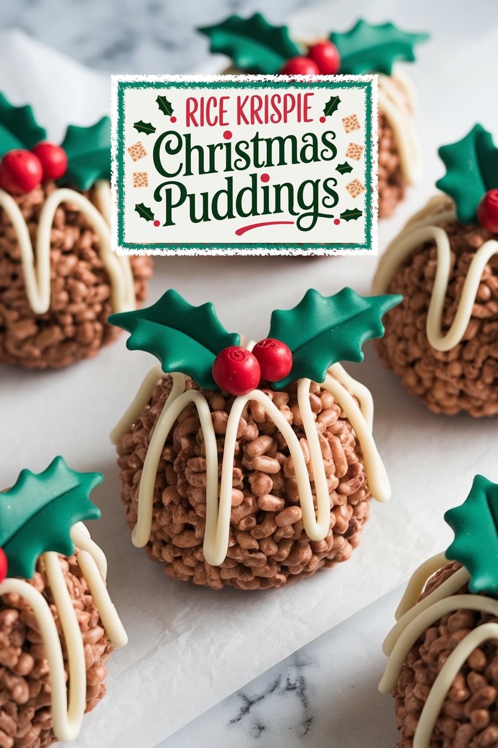 Rice Krispie Christmas Puddings topped with white chocolate drizzle and fondant holly decorations, ready to serve on a holiday table.