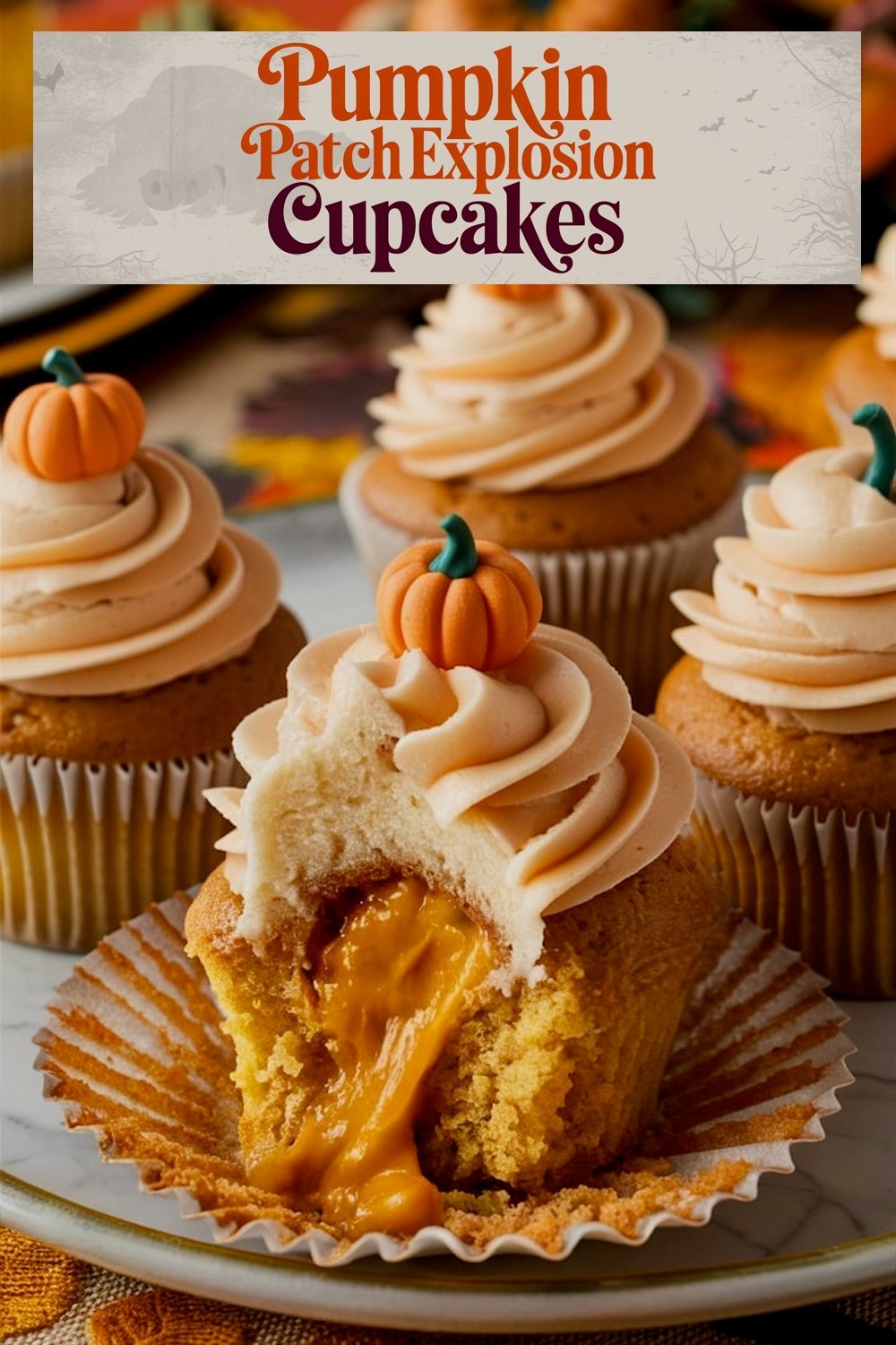 Festive pumpkin-themed cupcakes with cream cheese frosting, decorated with mini fondant pumpkins, crushed graham cracker "dirt," and green sprinkles to mimic a pumpkin patch, arranged on a rustic autumn background.