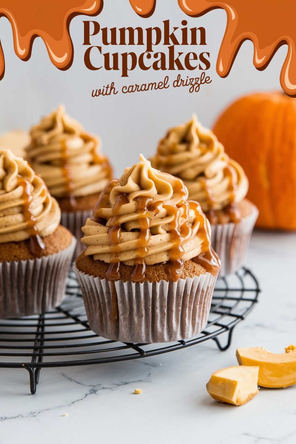 An array of pumpkin cupcakes topped with peanut butter frosting and caramel drizzle on a wire cooling rack, captioned 'Pumpkin Cupcakes with peanut butter frosting'.