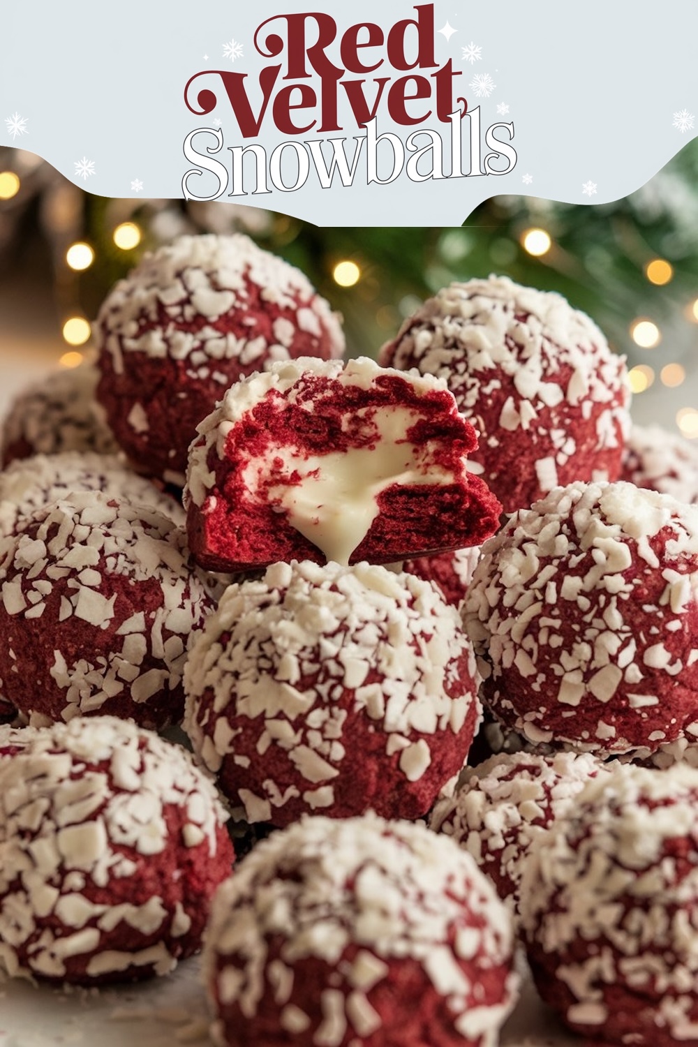 A festive display of red velvet snowball cookies sprinkled with coconut flakes, showcased on a plate surrounded by holiday decorations and twinkling lights.