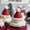 Festive Santa hat cupcakes topped with fresh strawberries and whipped cream resembling Santa's hat. The cupcakes have a rich chocolate base and are decorated with red liners, perfect for Christmas celebrations.