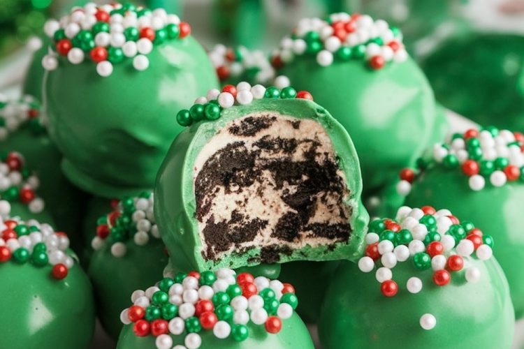 A plate of Irish Cream Oreo truffles decorated for St. Patrick's Day, with a bold text overlay that reads "Irish Cream Oreo Truffles." The rich green coating and holiday sprinkles evoke a fun, celebratory theme perfect for St. Patrick’s Day gatherings or festive treats.