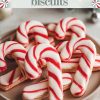 A plate of candy cane cookies decorated with marbled red and white icing, arranged for a holiday display. With a cozy, rustic background and festive decor touches, these cookies evoke the warmth of Christmas celebrations and are ideal for winter dessert tables or holiday-themed social media posts.
