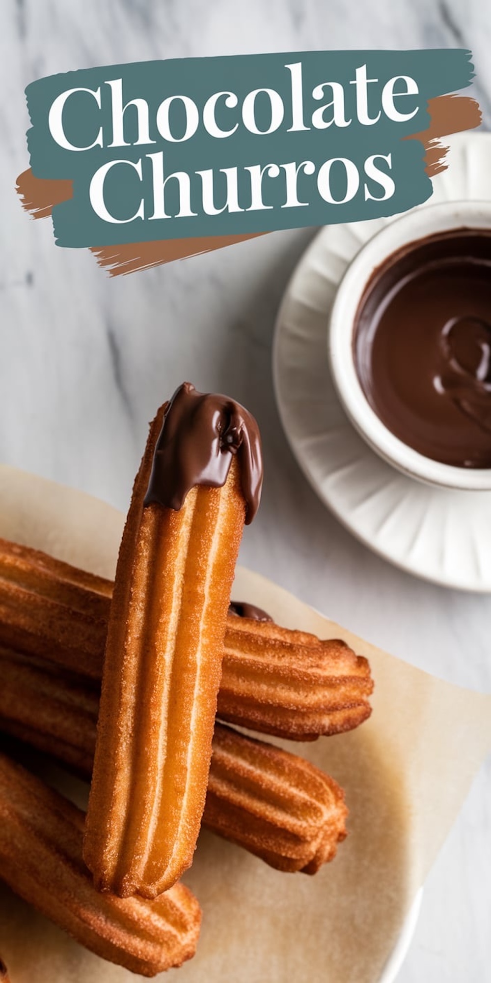 Single churro dipped in melted chocolate, held upright with a bowl of chocolate sauce in the background. The text overlay reads “Chocolate Churros,” accentuating the indulgent dessert pairing.