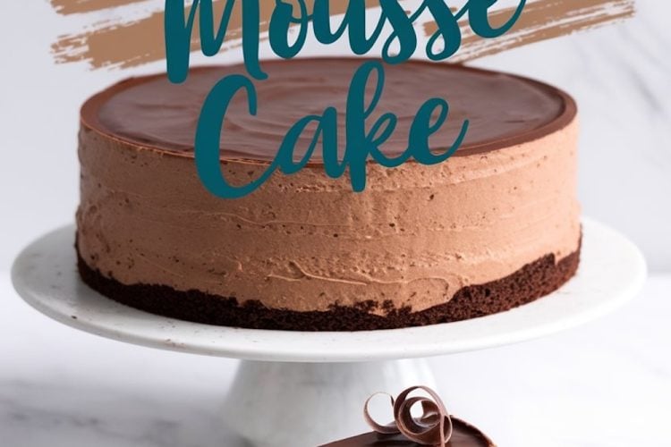 A full chocolate mousse cake with a glossy chocolate ganache top displayed on a cake stand. A slice is served on a plate below, showcasing the layers of chocolate crust, airy mousse, and smooth ganache. Decorative chocolate curls garnish the slice, adding a touch of elegance to the rich dessert presentation. Text overlay highlights “Chocolate Mousse Cake.”