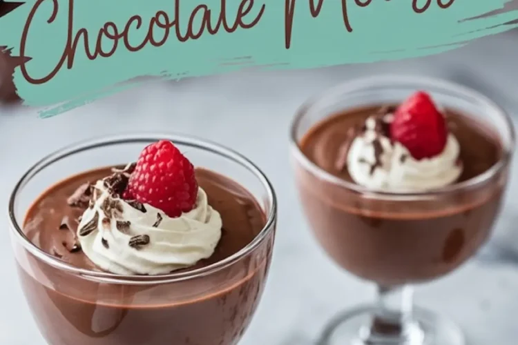 Two glasses of cottage cheese chocolate mousse garnished with whipped cream, a raspberry, and chocolate shavings, with one raspberry placed on the countertop and the text overlay “Cottage Cheese Chocolate Mousse.”