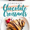 A collage featuring homemade chocolate croissants: the top image shows a single flaky croissant drizzled with rich chocolate sauce on a white surface, while the bottom image highlights a croissant plated with fresh raspberries and additional chocolate drizzle. The text overlay reads “Homemade Chocolate Croissants.”