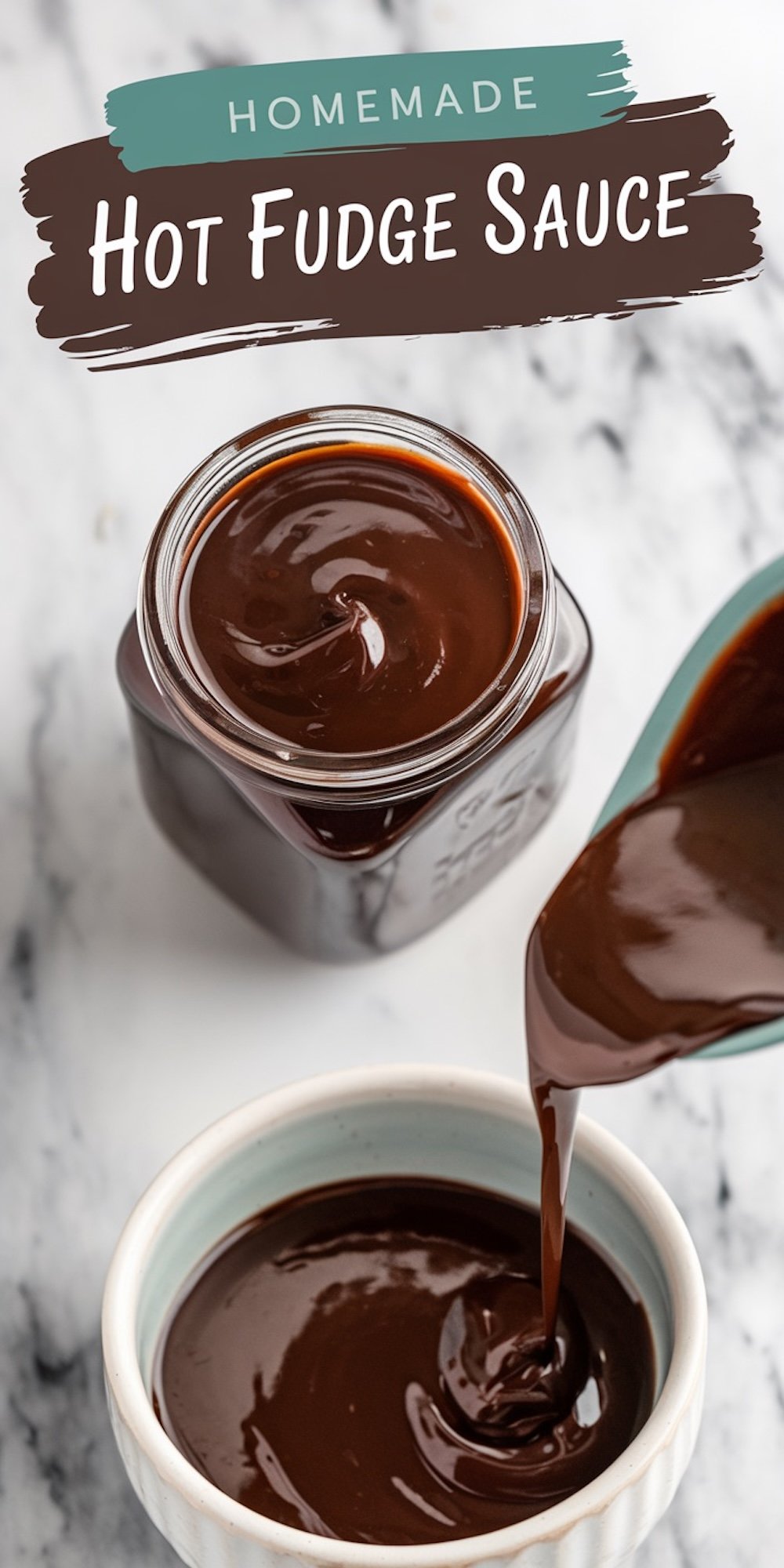 A jar of homemade hot fudge sauce on a marble countertop, with sauce being poured into a light blue bowl, highlighting its thick and velvety texture. Text overlay says “Homemade Hot Fudge Sauce.”