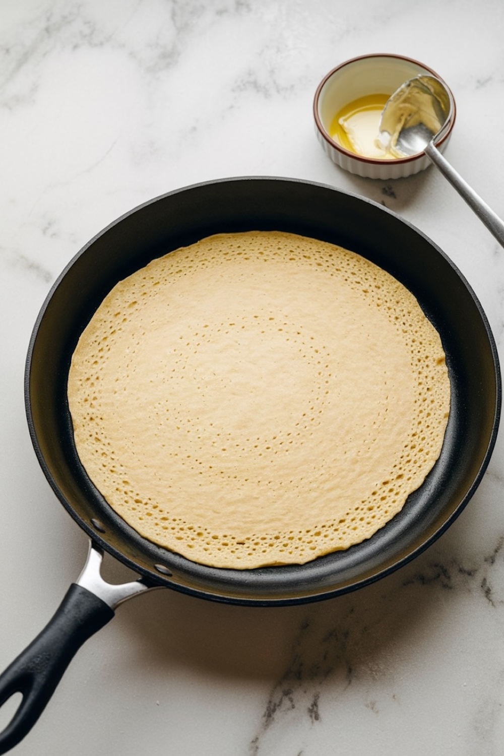 Master the art of crepe-making with this foolproof process. Ladle the batter into a nonstick pan, swirl to create a thin, even layer, and cook until lightly golden. Flip gently for a perfectly cooked crepe that’s soft and pliable, ready to fill with your favorite toppings like Nutella or fresh fruit. Crepe-making doesn’t have to be intimidating—it’s simple, quick, and worth every step!
