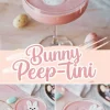 Collage image of a pink Bunny Peep-Tini cocktail in a coupe glass topped with a bunny-shaped foam garnish. Pastel Easter eggs and delicate typography enhance the whimsical, festive atmosphere.