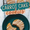 A collage featuring freshly baked carrot cake cookies with white icing drizzled on top. The cookies are placed on a baking sheet and a blue plate, where a broken cookie reveals its soft interior. The words “Carrot Cake Cookies” are overlaid in bold, colorful text.