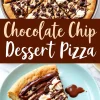A freshly baked chocolate chip dessert pizza cut into slices on a round metal tray. The golden crust is topped with melted chocolate, chocolate chips, white chocolate chips, and dollops of whipped cream, with a drizzle of chocolate sauce. A rich and indulgent sweet treat.