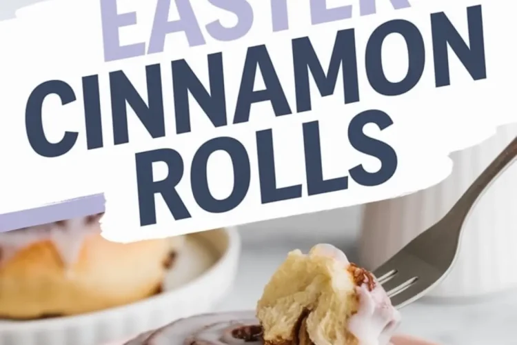 A close-up of Easter cinnamon rolls with icing and pastel candy eggs. The text overlay reads “Easter Cinnamon Rolls.” A soft, fluffy roll with a cinnamon swirl is on a pink plate, with a fork taking a bite. The background shows a baking dish with more cinnamon rolls.