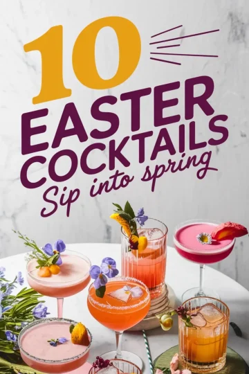 Colorful Easter cocktails on a white marble table, garnished with vibrant edible flowers, fresh fruit slices, and delicate herbs. The text above reads, “10 Easter Cocktails - Sip into Spring” in bold yellow and purple lettering. The drinks showcase a variety of bright hues, including pink, orange, and magenta, arranged in elegant glassware, creating a festive springtime atmosphere.