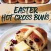 A baking dish of hot cross buns with deep golden crusts and white icing crosses. Below, a close-up of a single bun sliced open, showcasing a soft, spiced interior with raisins and a melting pat of butter. A banner reading “Easter Hot Cross Buns” overlays the center.