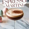 Easter Espresso Martini in a coupe glass on a marble countertop, garnished with cocoa powder. The background includes pastel Easter eggs and themed text reading “Easter Espresso Martini.”