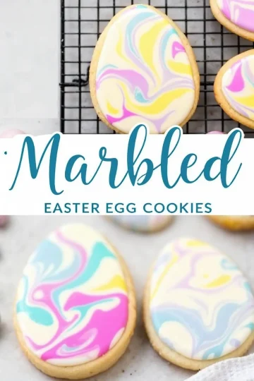 Egg-shaped sugar cookies decorated with pastel marbled royal icing in pink, yellow, blue, and purple, arranged on a cooling rack and marble countertop. A text overlay reads “Marbled Easter Egg Cookies.”