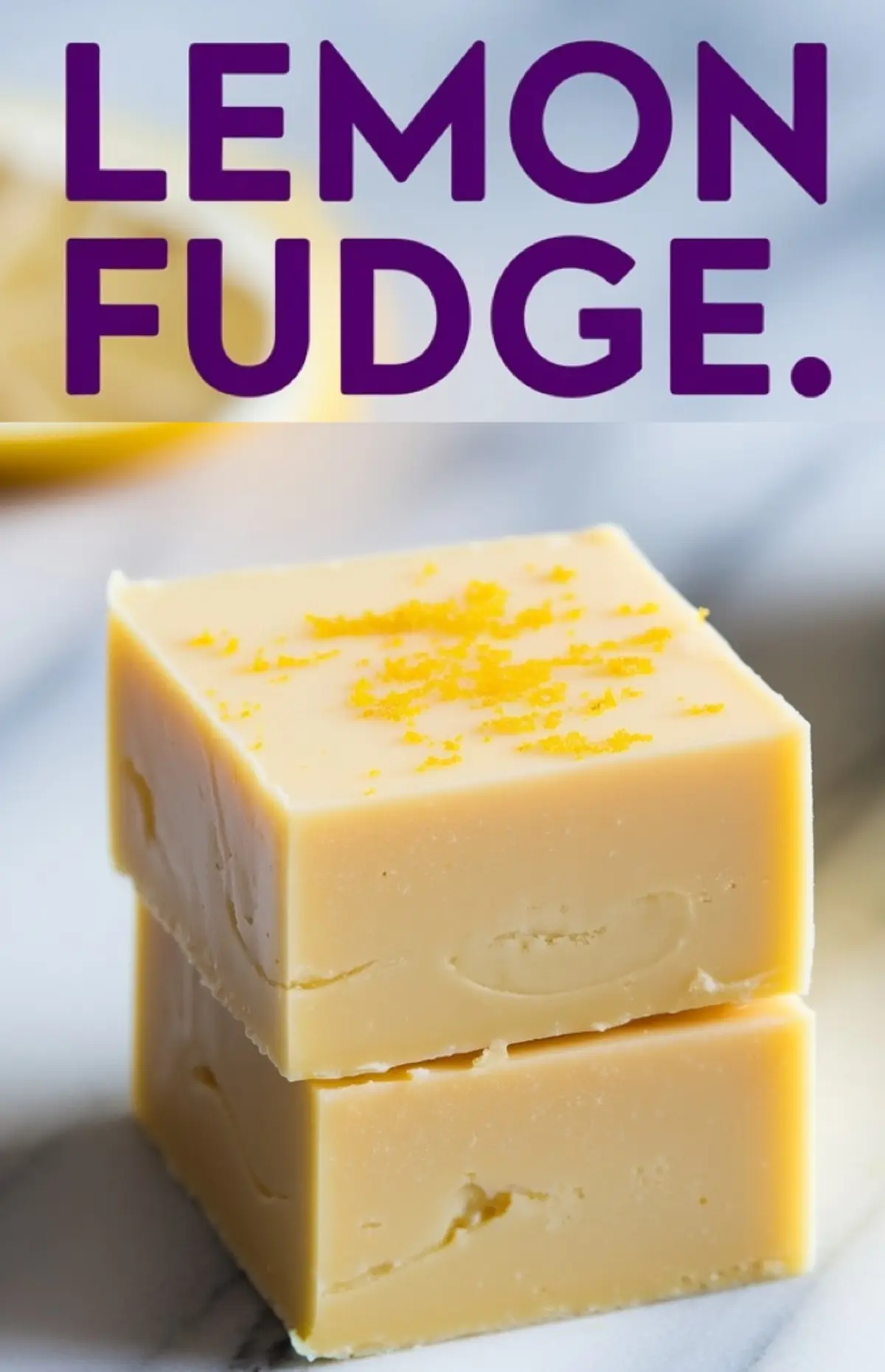 Close-up of two thick, creamy lemon fudge squares stacked on marble, with a sprinkle of lemon zest on top, and bold purple “LEMON FUDGE.” text overlay above.