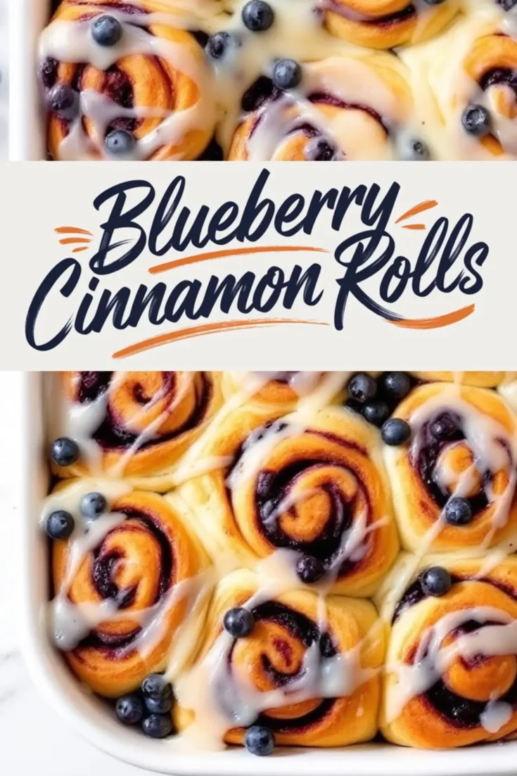 Blueberry cinnamon rolls baked in a white ceramic dish, generously drizzled with icing and garnished with fresh blueberries, with a centered text overlay that reads “Blueberry Cinnamon Rolls.”