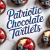 Overhead display of chocolate tartlets with vanilla filling, raspberries, blueberries, and star-shaped white chocolate, encircling a central “Patriotic Chocolate Tartlets” text design on marble.
