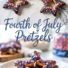 Star-shaped Fourth of July pretzels dipped in rich chocolate and decorated with red, white, and blue sprinkles, displayed on a marble surface and stacked on a white plate for festive patriotic treats.