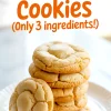 Stack of golden cake mix cookies on a white plate with one cookie propped for texture, featuring overlay text “Cake Mix Cookies (Only 3 Ingredients!)”, ideal for easy cake mix desserts.