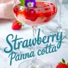 Single coupe glass filled with strawberry panna cotta topped with red strawberry sauce, a sliced strawberry, fresh mint leaves, and a purple edible flower, with text reading “Strawberry Panna Cotta” styled in blue script on a marble surface.