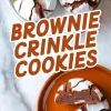 Vertical Pinterest graphic shows brownie crinkle cookies: a plate piled high, bold title text “Brownie Crinkle Cookies,” and a halved cookie on an orange plate revealing gooey center.