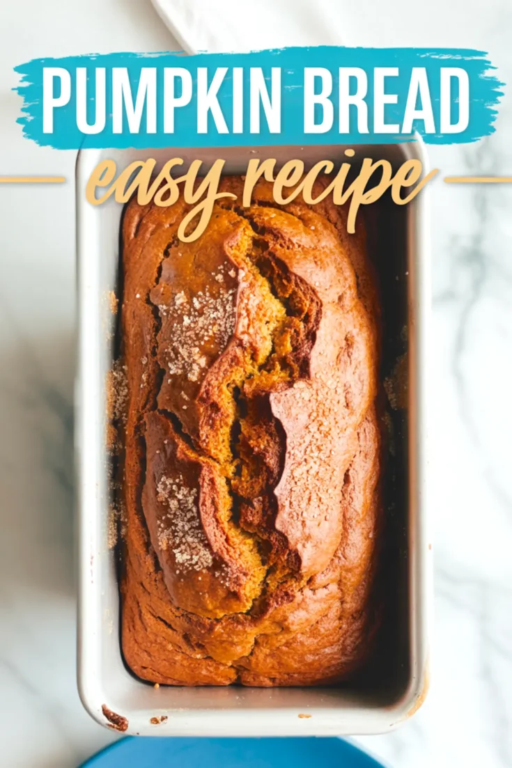 Overhead view of pumpkin bread in a loaf pan topped with coarse sugar, labeled “Pumpkin Bread Easy Recipe” with rustic style text overlay.