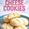 Collage image of cream cheese cookies. The top half shows the text “Cream Cheese Cookies” in bold pink letters. The bottom half displays a stack of cookies on a blue plate with one cookie cut open, revealing a soft, creamy center and a light dusting of powdered sugar.