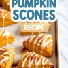 Freshly baked pumpkin scones on a parchment-lined baking sheet, topped with white icing drizzle and a sprinkle of cinnamon, with bold text reading "Easy Pumpkin Scones Recipe."