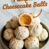 Stack of no-bake pumpkin cheesecake balls coated in white chocolate and drizzled with additional white chocolate, topped with graham cracker crumbs, with one truffle halved to show spiced filling and text overlay.