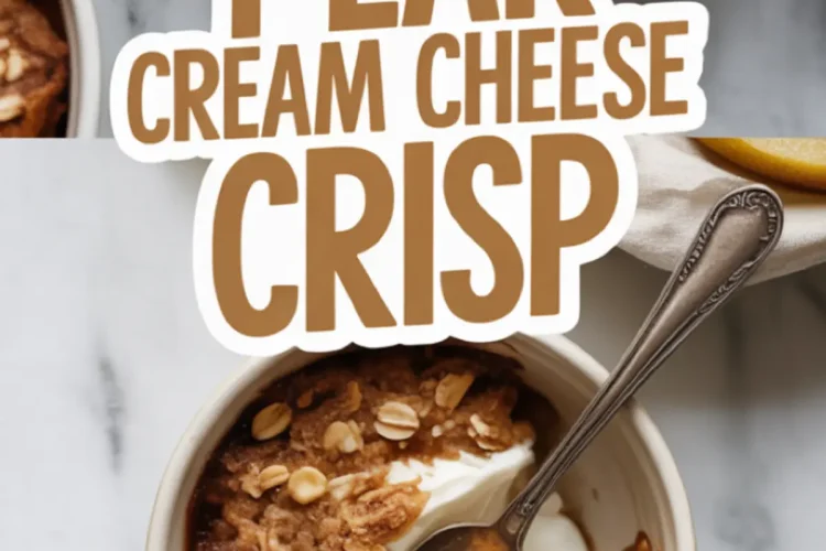 Top-down view of a pear cream cheese crisp served in a small white ramekin. The dessert is topped with oat crumble and a dollop of cream cheese, with visible pear slices. A metal spoon rests inside, ready to scoop.