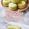 Top half shows a pink plate stacked with pistachio macarons filled with pale pink buttercream and sprinkled with chopped nuts; bottom half highlights a single macaron cut in half to reveal the textured pistachio filling and smooth center cream, with “Pistachio Macaron” text overlay.