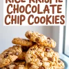 Close-up of Rice Krispie chocolate chip cookies stacked on a blue plate near a window, showcasing golden crispy texture and melted chocolate chips with bold text overlay.