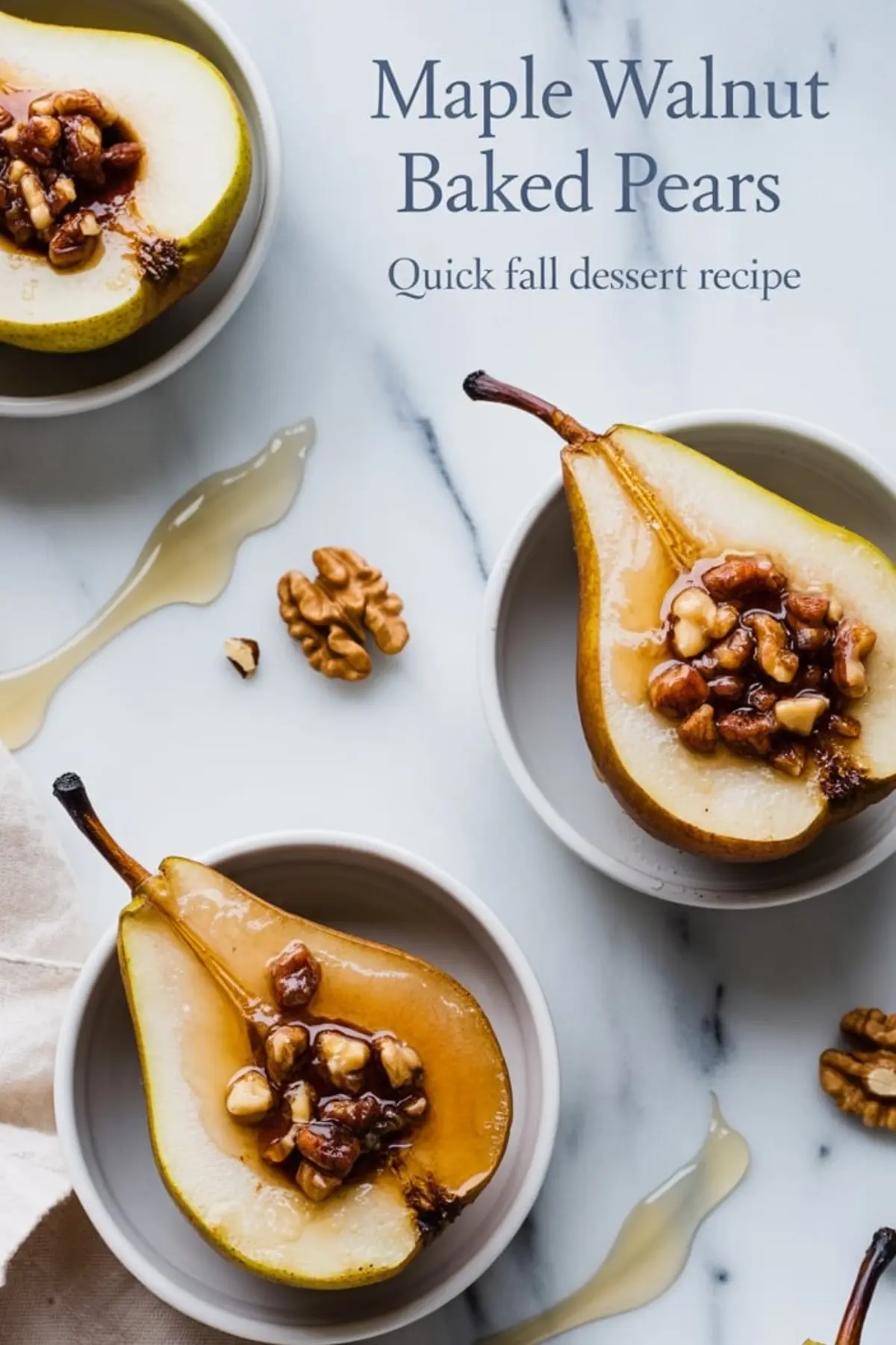  Overhead view of maple walnut baked pears in white bowls on a marble background, with text overlay reading “Maple Walnut Baked Pears - Quick fall dessert recipe.”