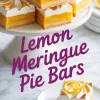 Lemon meringue pie bars stacked on a white cake stand, showing vibrant yellow lemon curd and golden meringue topping, with a plated slice in the foreground.