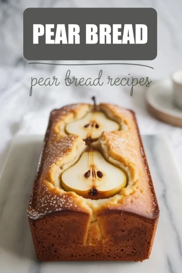 Golden pear cake loaf topped with halved pears, baked into a soft, moist crumb, displayed on a marble slab with bold “Pear Bread” and “pear bread recipes” text overlay.
