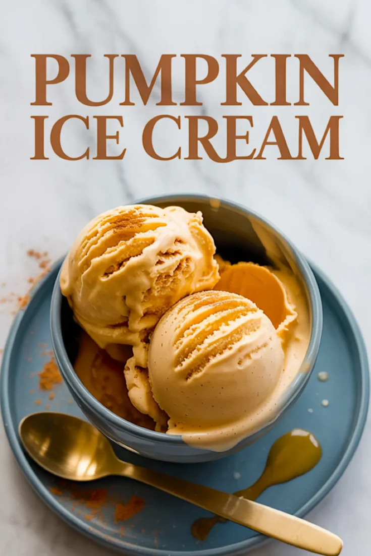 Blue ceramic bowl filled with scoops of pumpkin ice cream topped with cinnamon, placed on a matching plate with a gold spoon and decorative text reading “Pumpkin Ice Cream.”